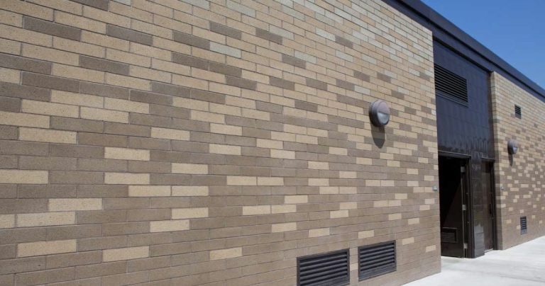Architectural masonry wall showing coordinated brick colors and consistent mortar joints